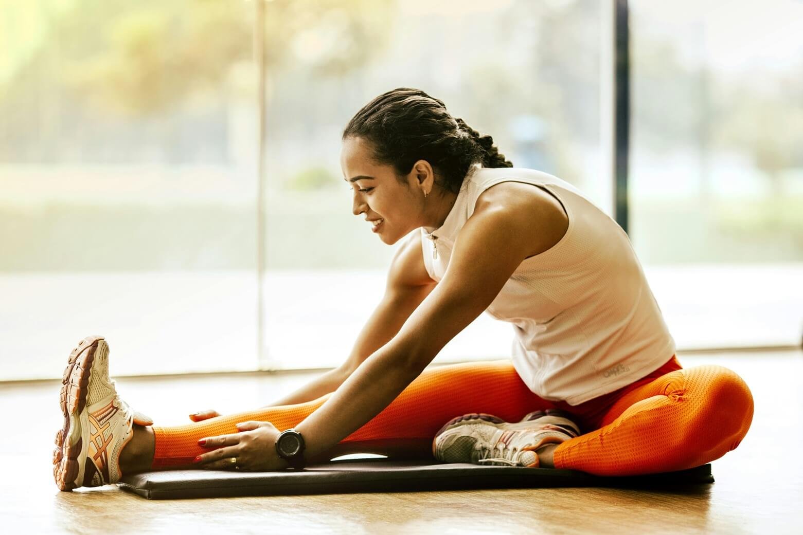 Female doing yoga pose to stay healthy