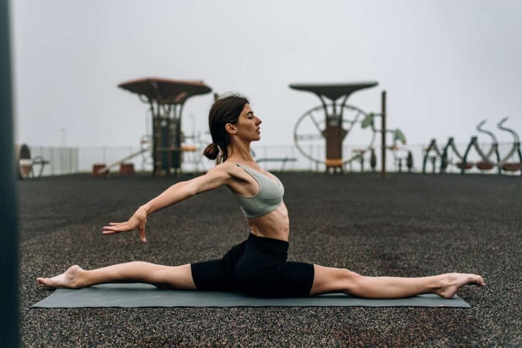 girl doing yoga for flexible legs