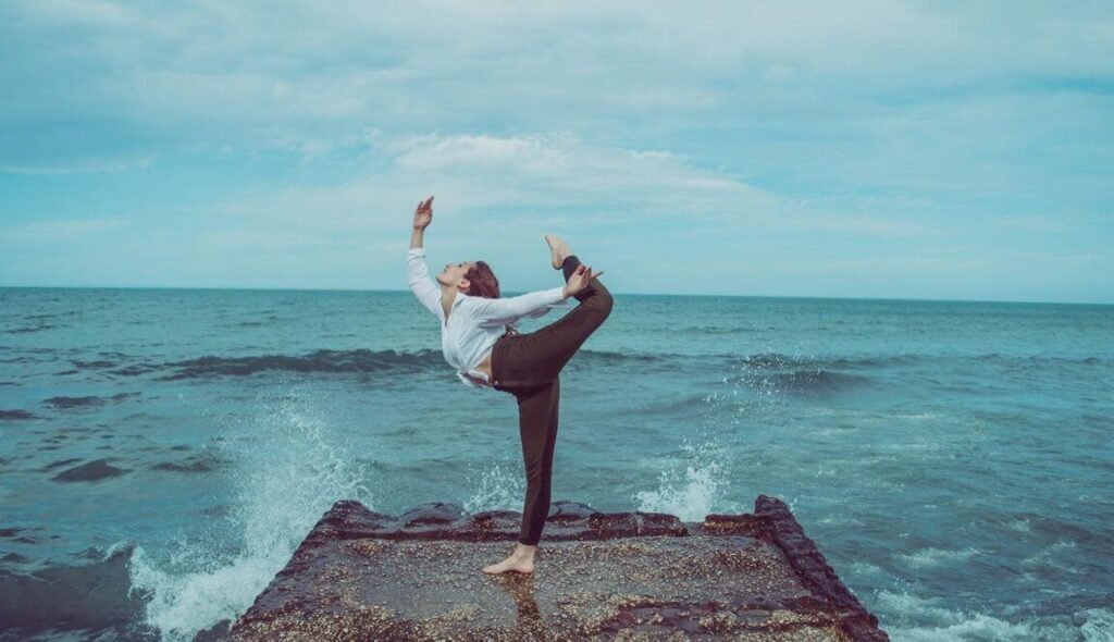girl doing yoga to stay healthy