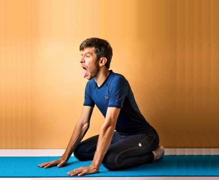 man doing lion yoga pose