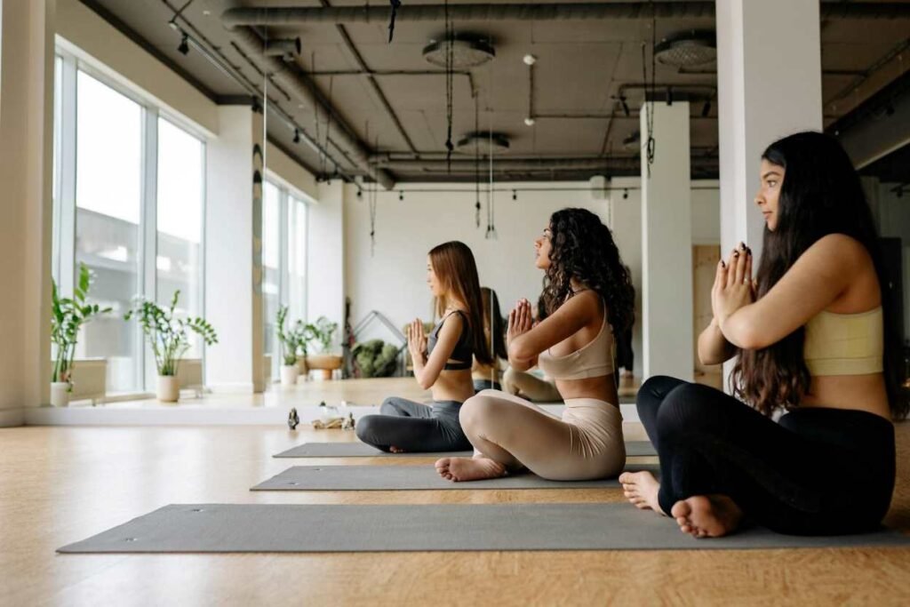 girls doing yoga to relax body
